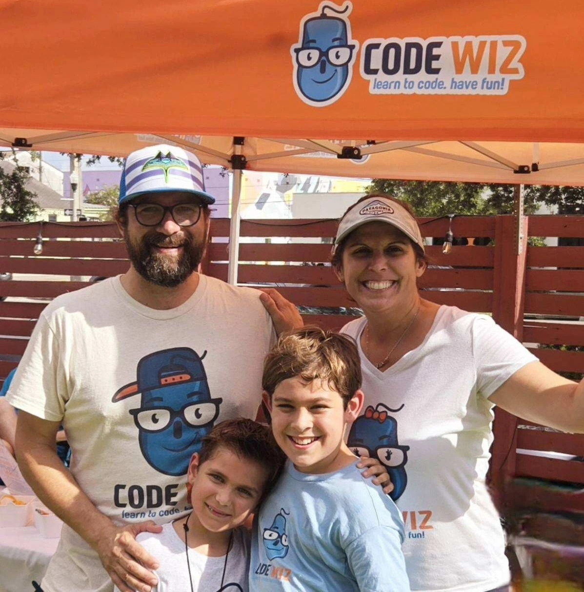 Scott and Jennifer Callison with their family at a Code Wiz event